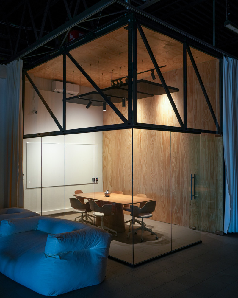 A glass room inside the space